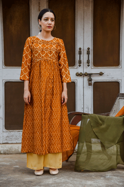 Tonal tan dabu shell tucks tunic